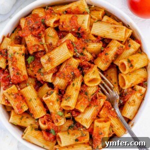 rigatoni arrabbiata on a plate ready to eat