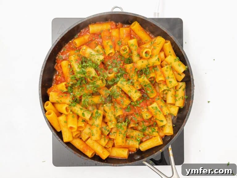 Fiery Rigatoni 21 fresh parsley on top of the pasta