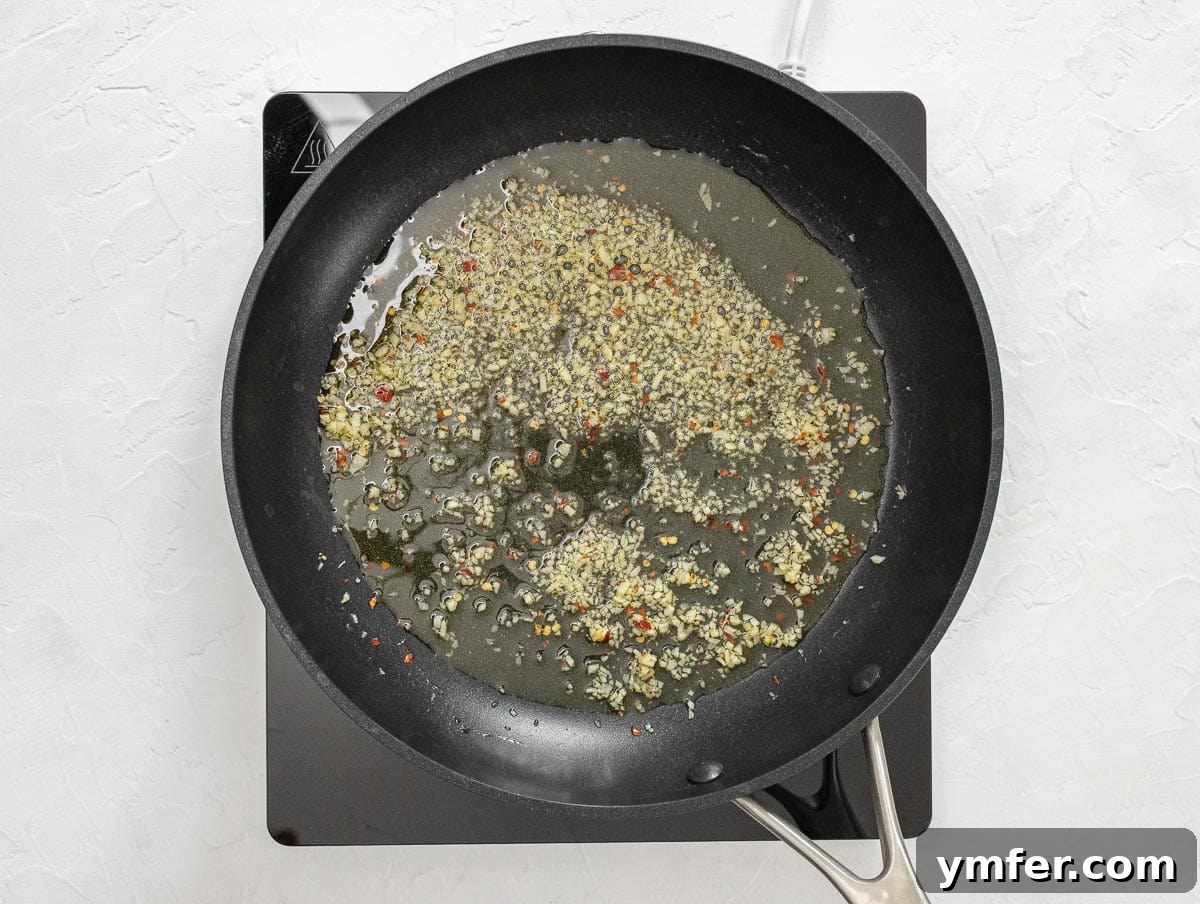 Fiery Rigatoni 6 frying garlic and red pepper flakes in olive oil for arrabbiata sauce