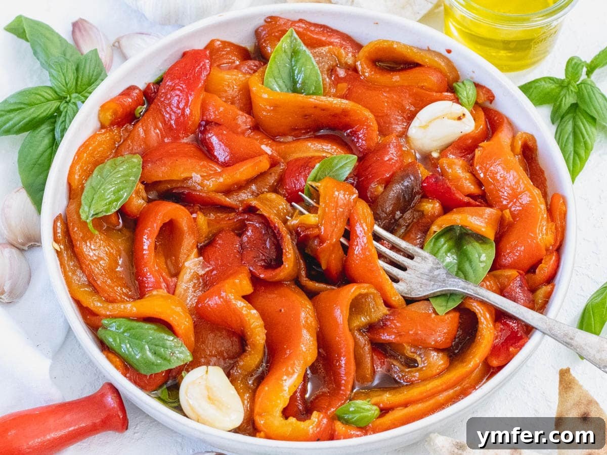 45 Delightful Vegetable Sides 17 Roasted bell peppers with a fork