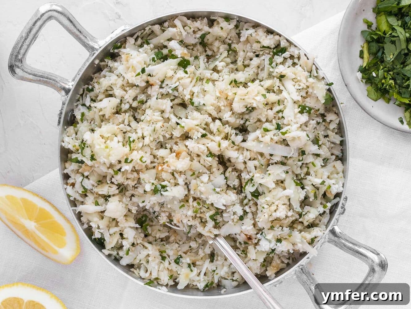 45 Delightful Vegetable Sides 25 cauliflower rice with parsley and lemon in a pot