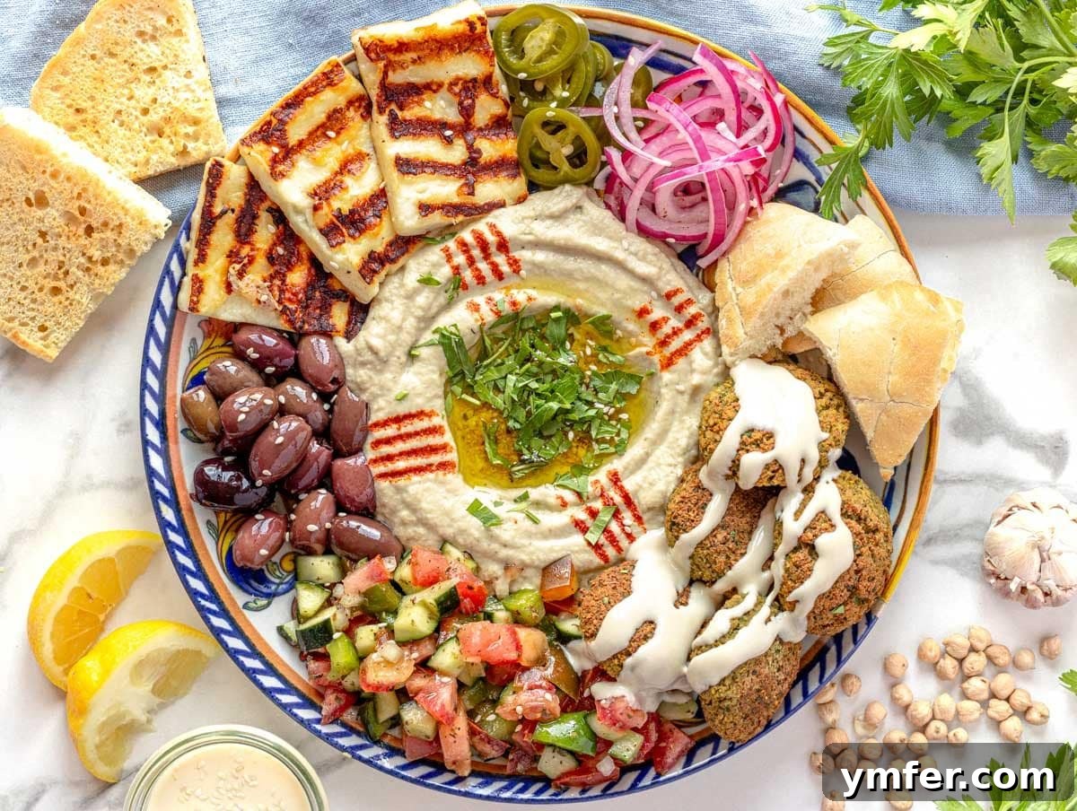 45 Delightful Vegetable Sides 35 falafel bowl with pita bread, shirazi, and baba ganoush