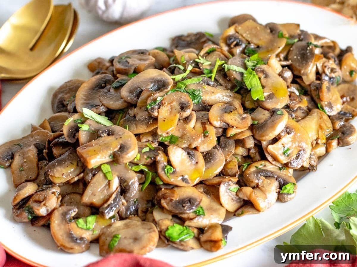 45 Delightful Vegetable Sides 7 sauteed mushrooms with parsley served on a white platter