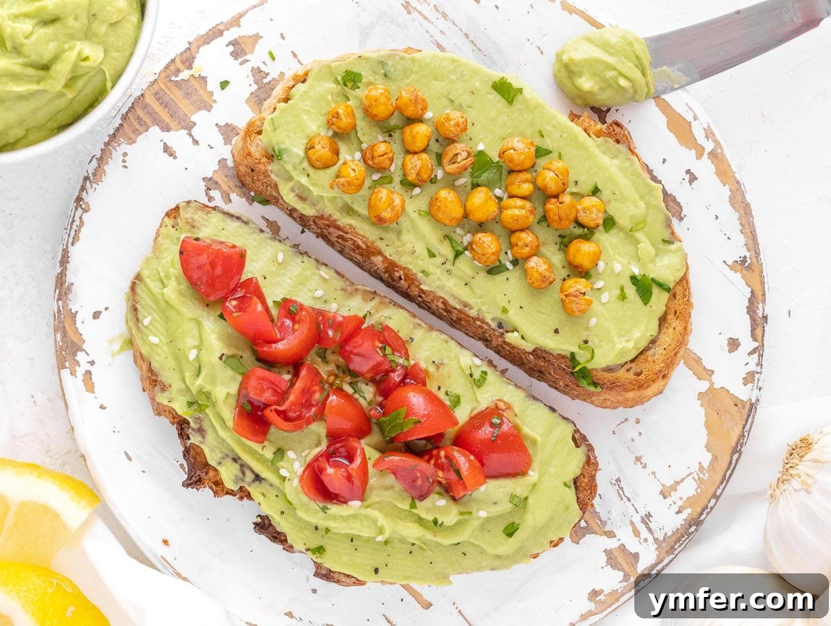 30 Quick & Wholesome Vegan Lunch Recipes 18 avocado spread on toast with roasted chickpeas and cherry tomatoes