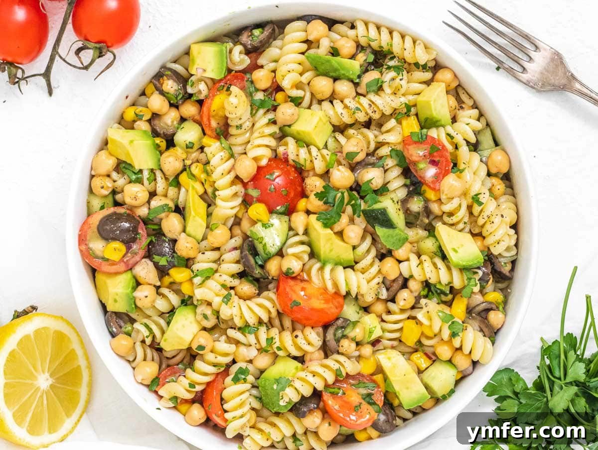 30 Quick & Wholesome Vegan Lunch Recipes 26 chickpea pasta salad in a bowl