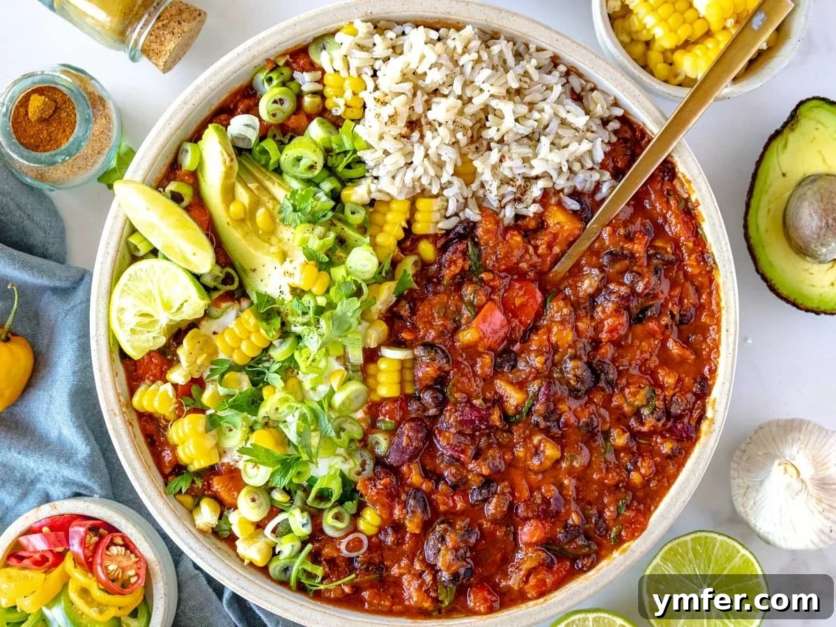 Feast on Plants: 35 Vibrant Recipes 28 Vegetarian chili beautifully served in a pristine white bowl.