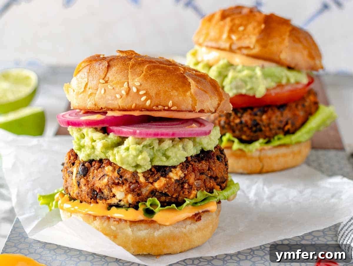 Feast on Plants: 35 Vibrant Recipes 36 Two perfectly grilled black bean burgers presented side by side.