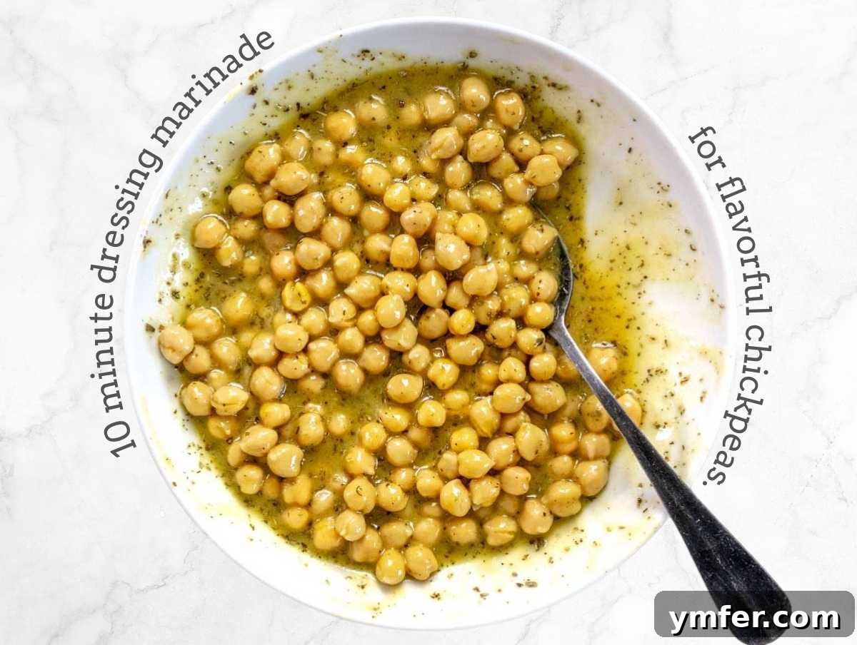Zesty Quinoa Chickpea Power Salad 6 Marinated chickpeas soaking in a honey mustard dressing.