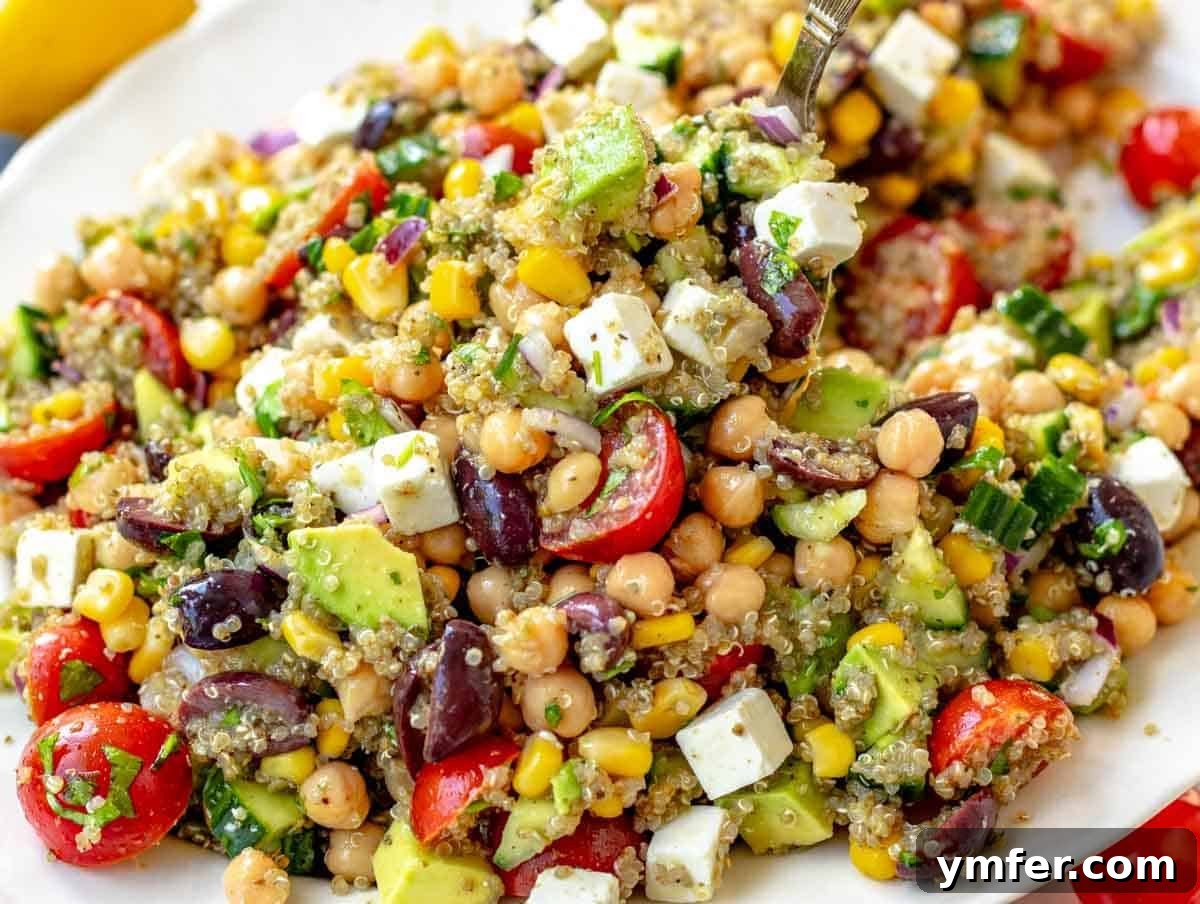 Zesty Quinoa Chickpea Power Salad 8 Finished Chickpea Quinoa Salad with feta cubes, ready to eat.