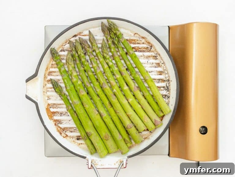 asparagus arranged on a grill pan