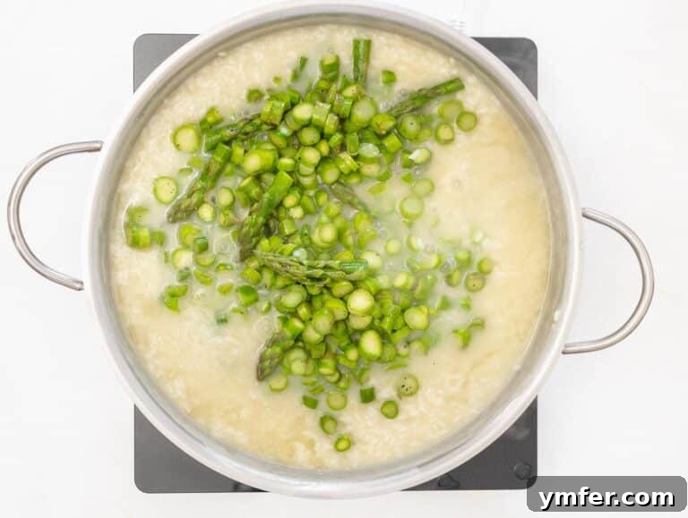 Spring Green Risotto 29 adding asparagus to risotto