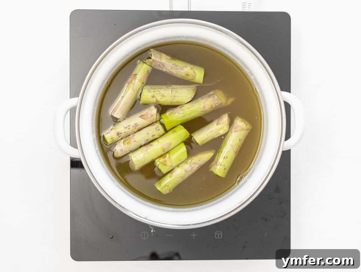 Spring Green Risotto 8 vegetable broth with asparagus trimmings