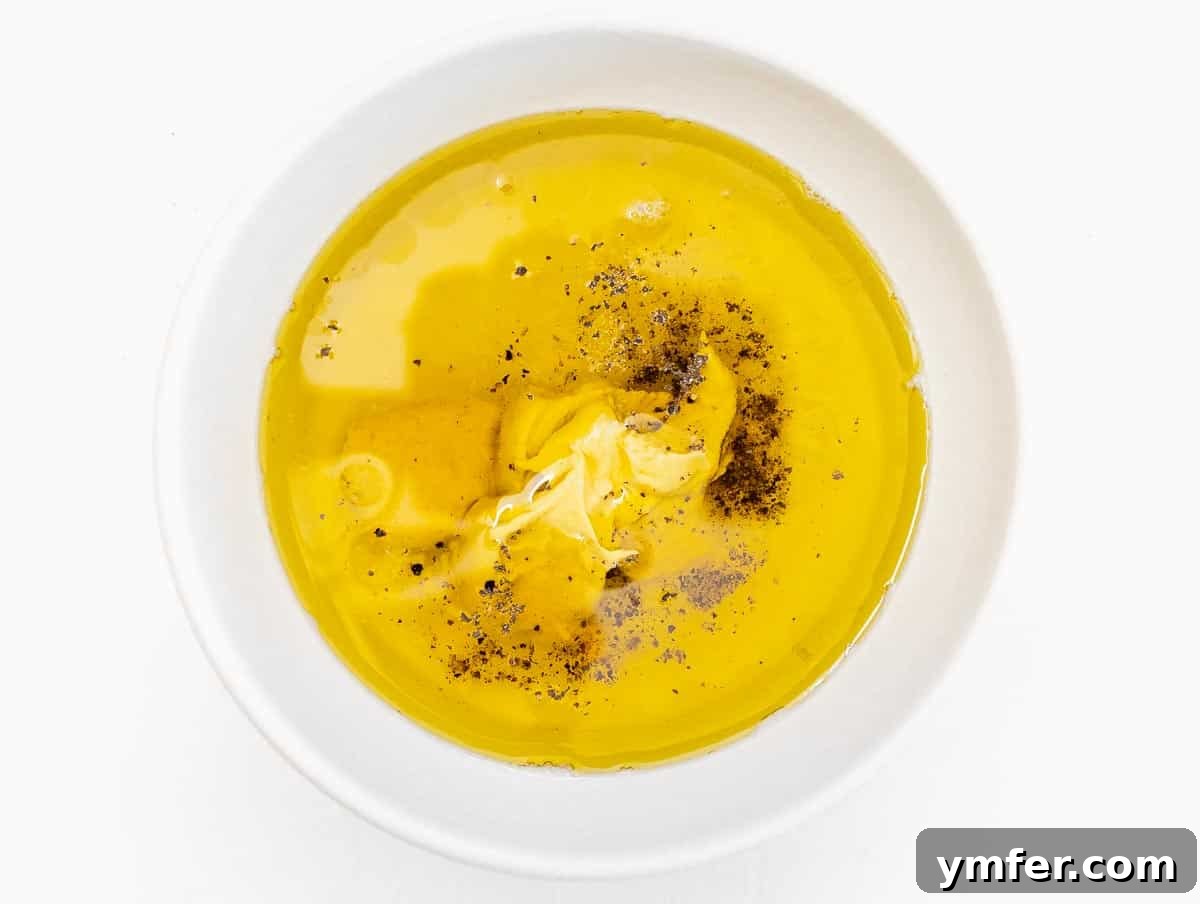 Golden Honey Mustard Bliss 6 All ingredients for honey mustard dressing neatly placed in a small mixing bowl