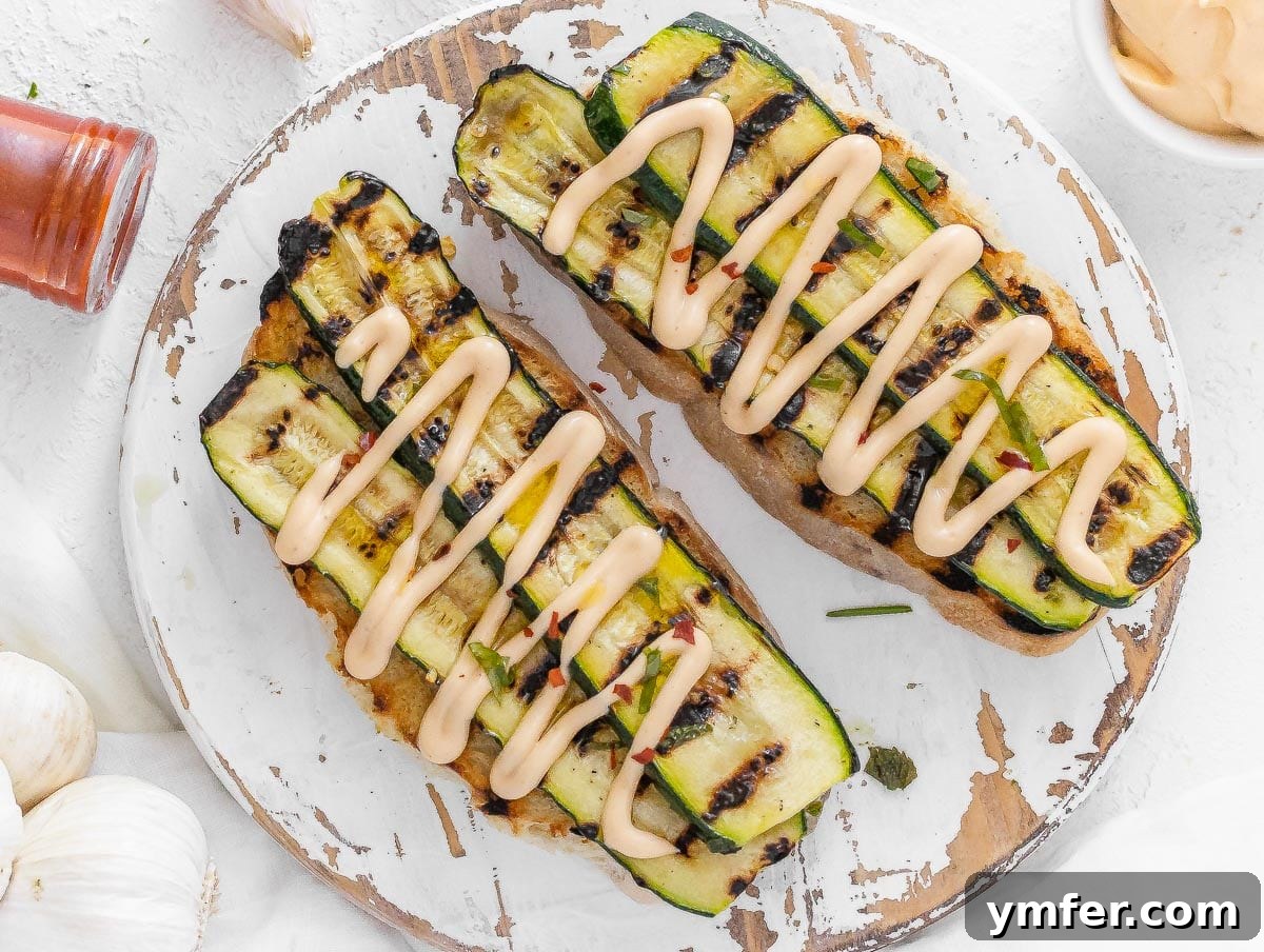 Perfectly Charred Zucchini 15 grilled zucchini on toasted bread with chipotle sauce on top