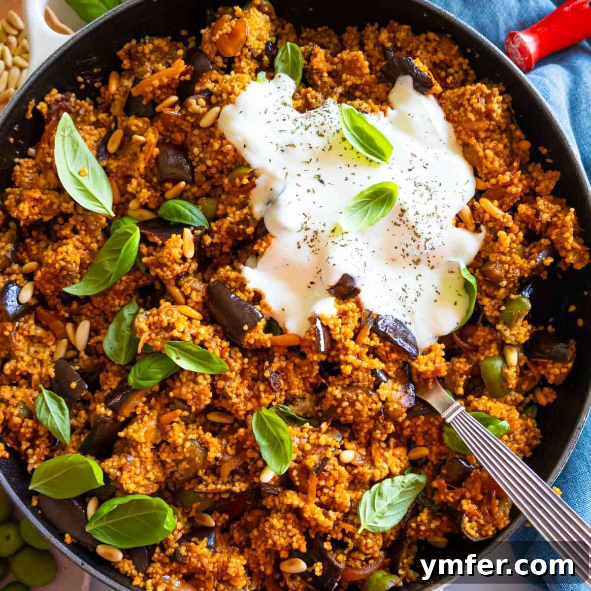 Eggplant Elevated 30 Exciting Recipes 11 Mediterranean couscous salad with caponata-inspired vegetables, ideal for a healthy summer lunch or plant-based meal prep.