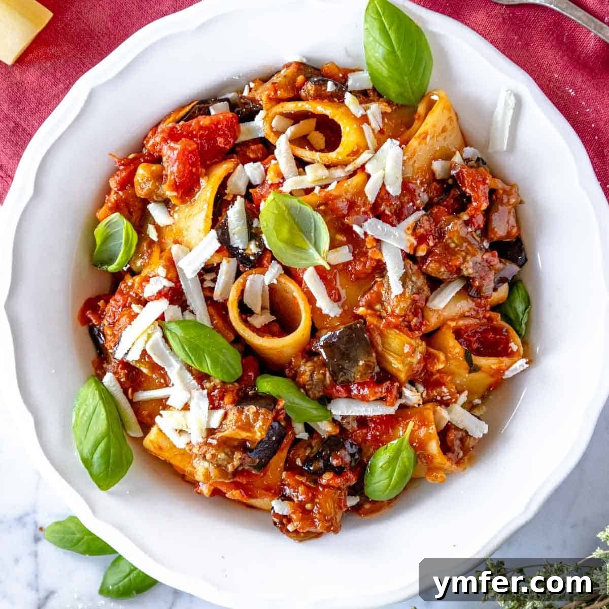Eggplant Elevated 30 Exciting Recipes 8 Pasta alla Norma with fresh basil and ricotta salata.
