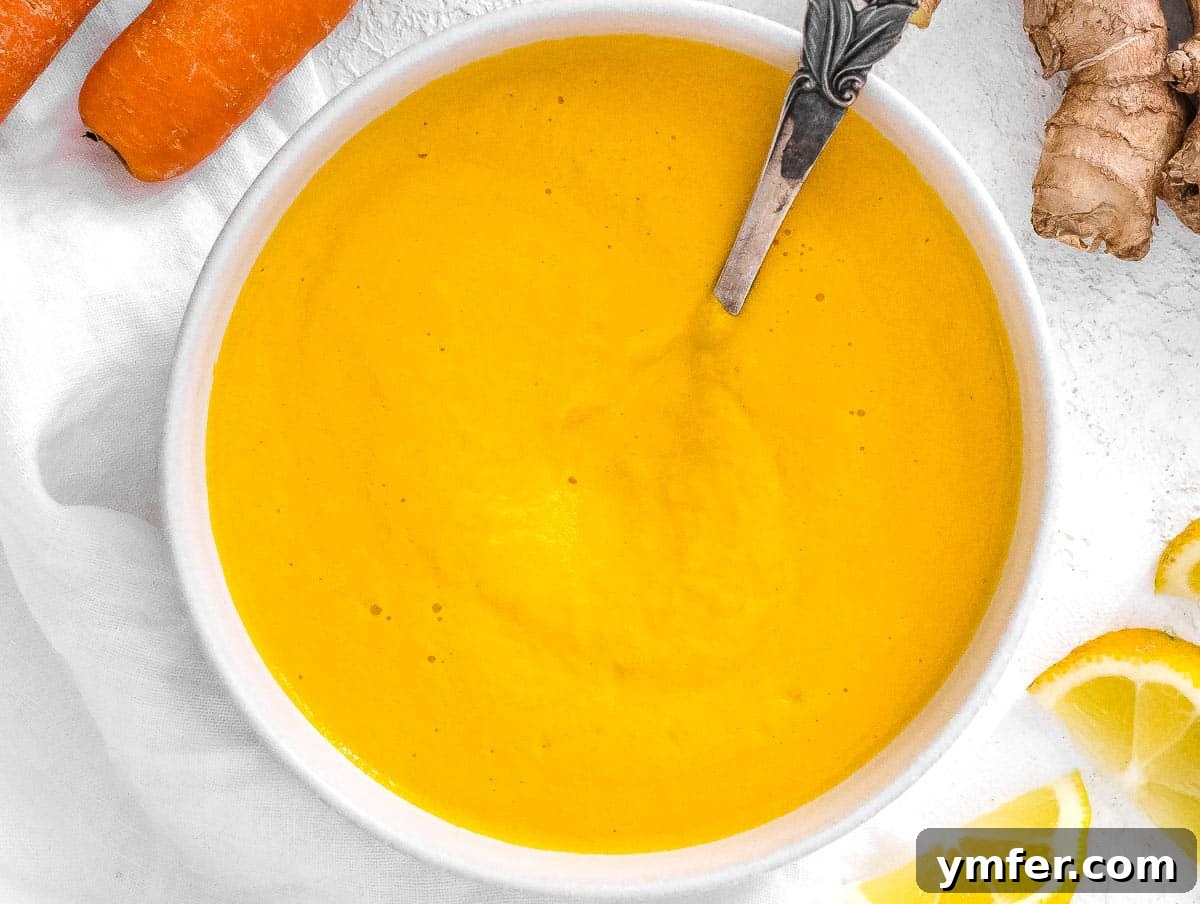 Vibrant Carrot Ginger Dressing 7 The smooth, vibrant carrot ginger dressing poured into a serving bowl.