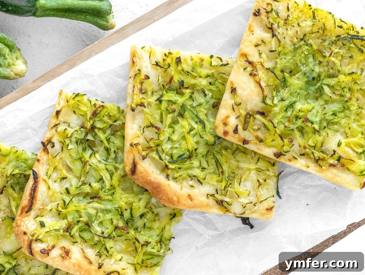 Rustic Zucchini Focaccia 14 Freshly baked golden-brown focaccia with zucchini topping, just out of the oven.