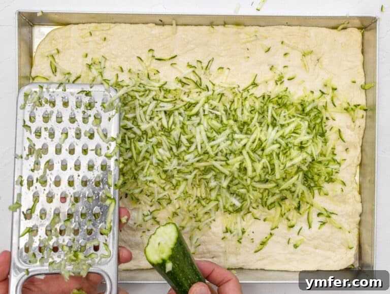 Rustic Zucchini Focaccia 22 shredded zucchini on top of focaccia