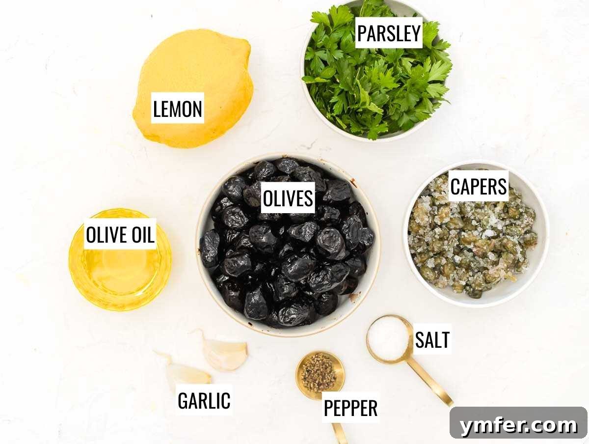 Rich Olive Spread 4 A selection of fresh ingredients for olive tapenade: olives, capers, garlic, parsley, lemon