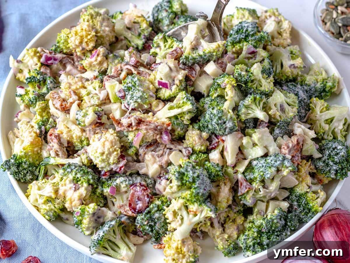 35 Vibrant Vegetarian Lunch Ideas 23 A vibrant and healthy broccoli salad served on a white plate.