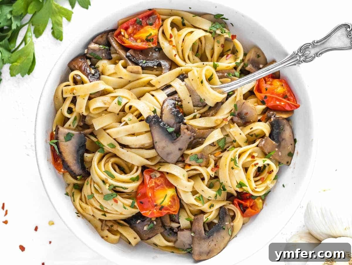 35 Vibrant Vegetarian Lunch Ideas 33 Creamy vegan mushroom pasta with cherry tomatoes and fresh parsley.