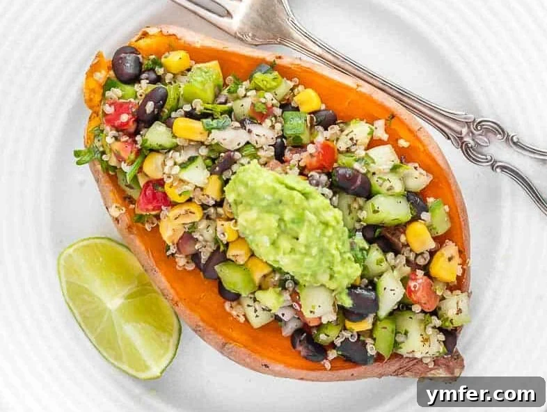 35 Vibrant Vegetarian Lunch Ideas 34 A perfectly baked sweet potato in an air fryer, generously loaded with black beans.