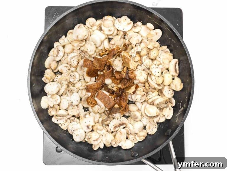 35 Vibrant Vegetarian Lunch Ideas 39 cooking mushrooms on a pan