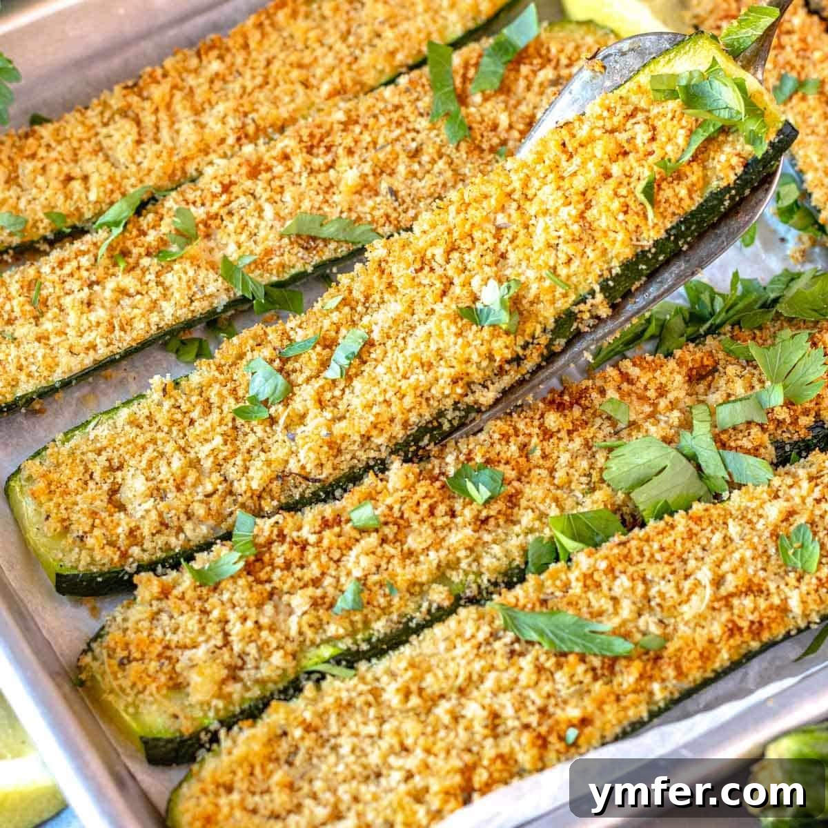 Roasted zucchini slices with breadcrumbs.