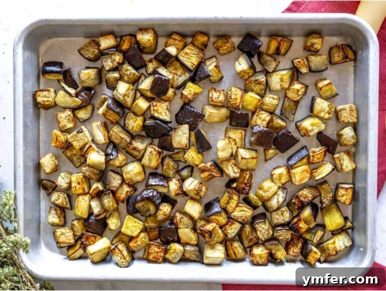 Step 1 Cubed eggplant on baking tray just roasted.
