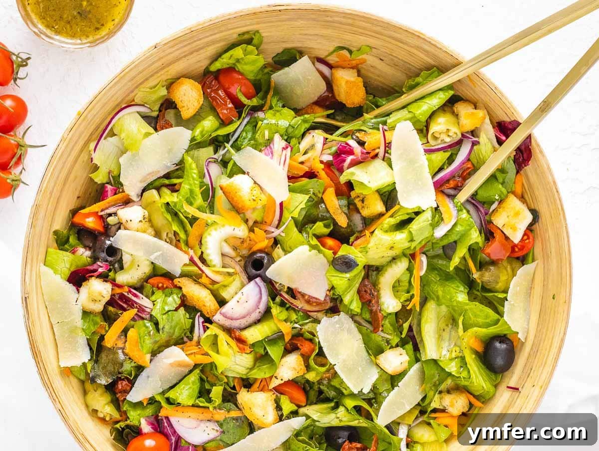 Italian salad topped generously with delicate shavings of Parmesan cheese