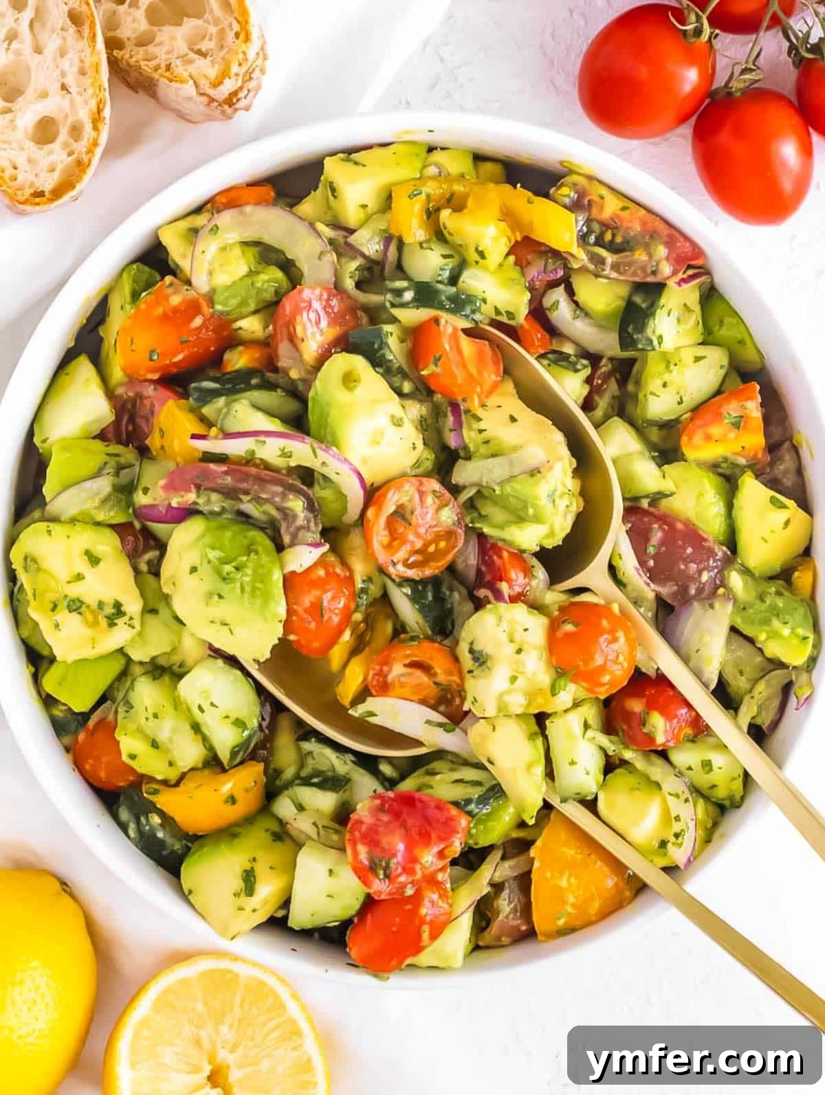 Fresh Avocado Bliss 2 A vibrant, creamy avocado salad with tomatoes, cucumber, and red onion.