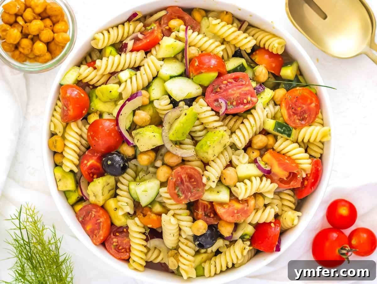 Fresh Avocado Bliss 9 Avocado salad mixed with short pasta, creating a complete pasta salad dish.