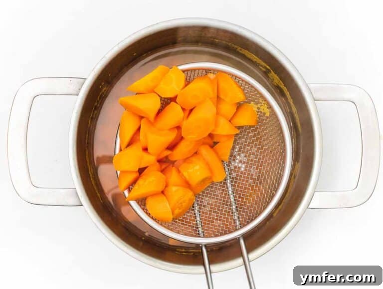 Moroccan Spiced Carrot Salad 6 draining boiled carrots