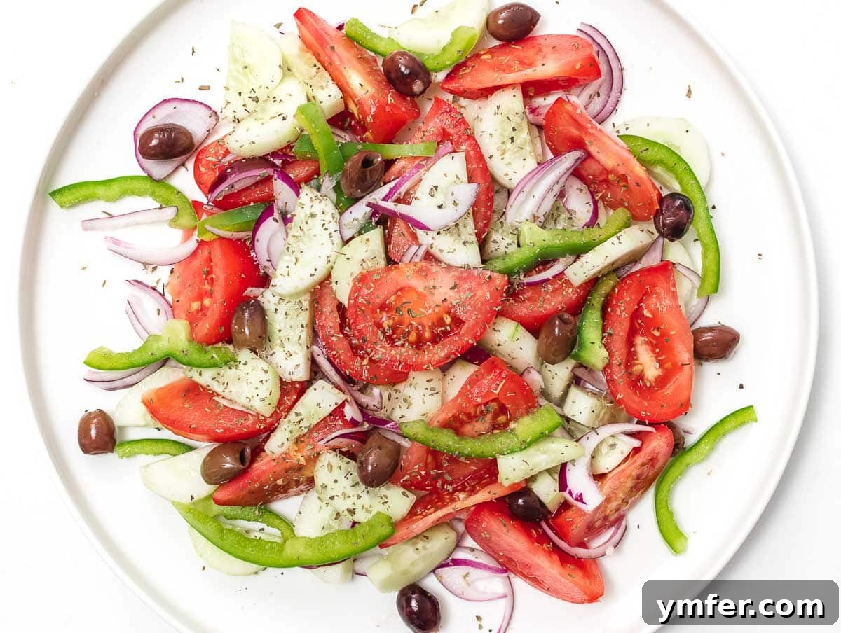 Horiatiki: The Quintessential Greek Village Salad 7 veggies arranged on a plate