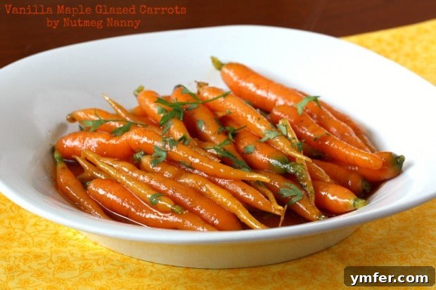 Exquisite Vanilla Maple Glazed Carrots 7 A close-up of a serving of vanilla maple glazed carrots, showing the delectable sheen of the glaze and the inviting texture of the tender carrots.