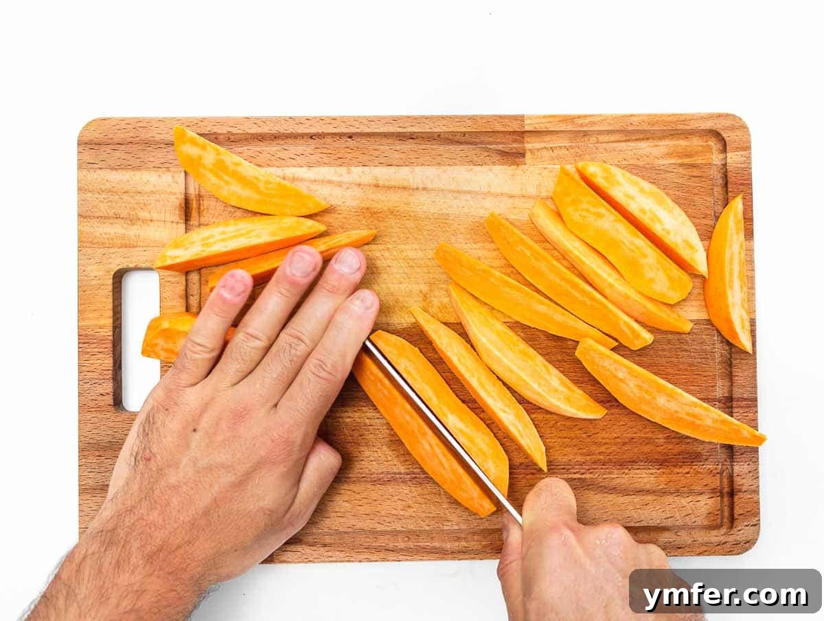 Crispy Sweet Potato Wedges 5 cutting the sweet potatoes into wedges
