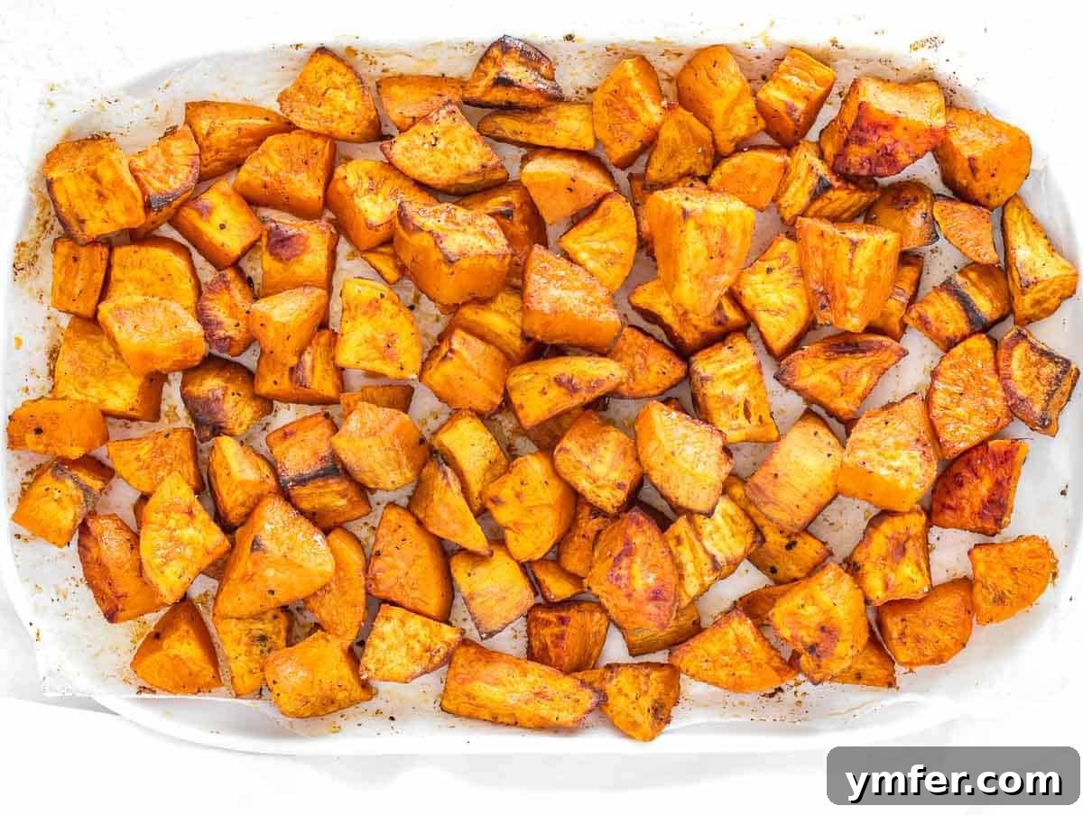 Golden Roasted Sweet Potatoes 3 roasted sweet potatoes on a serving platter