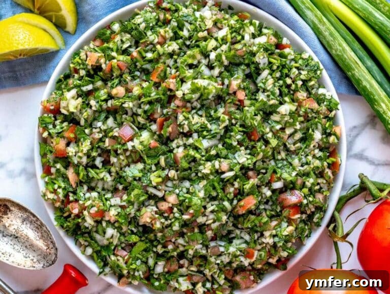 Fresh and Zesty Tabbouleh Salad 13 Tabouli (tabbouleh) salad served in lettuce cups and with pita on the side, perfect for a plant-based side dish.