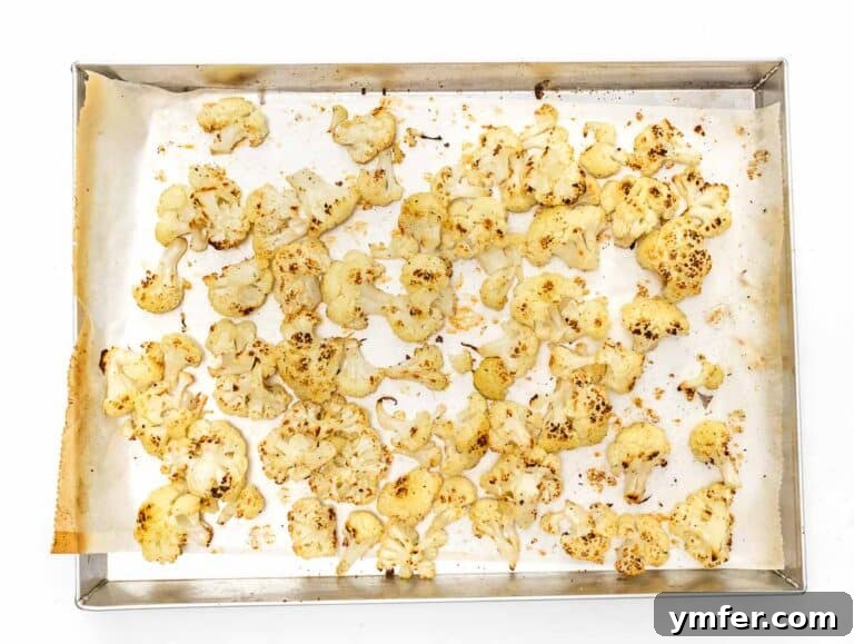 Hearty Lentil & Cauliflower Bowl 14 roasted cauliflower on a baking tray