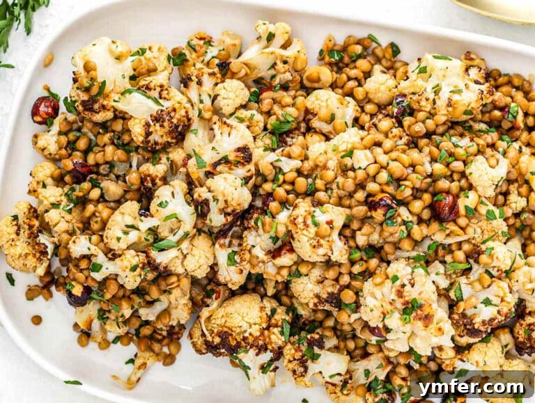 Hearty Lentil & Cauliflower Bowl 17 Cauliflower lentil salad on a long white platter