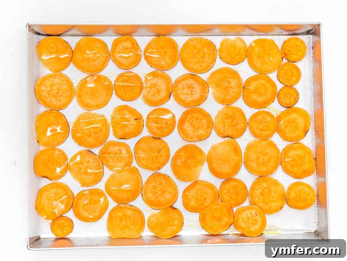 Artisan Sweet Potato Crisps 11 sweet potato slices on a baking sheet