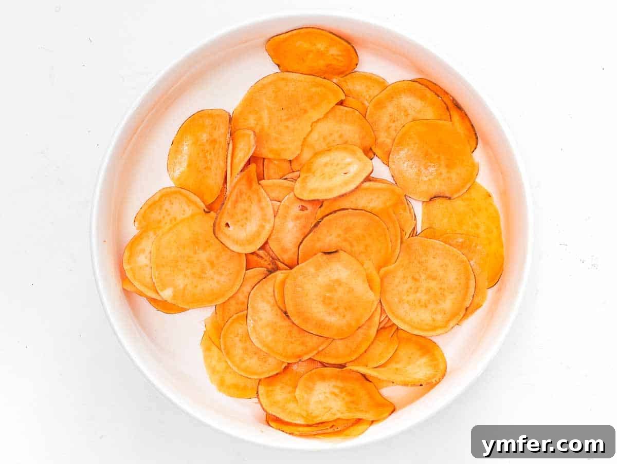 Artisan Sweet Potato Crisps 10 tossing sweet potato slices with olive oil and salt
