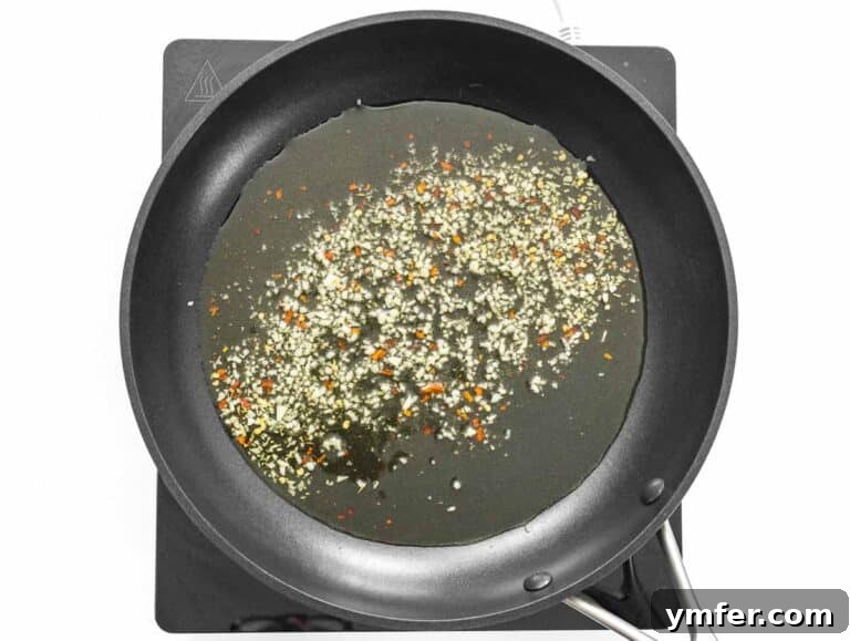 Minced garlic and red pepper flakes in oil