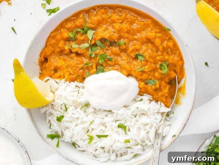 Hearty Lentil Harvest 30 Wholesome Recipes 31 Serving creamy lentil curry over basmati rice with fresh lemon, cilantro, and yogurt.