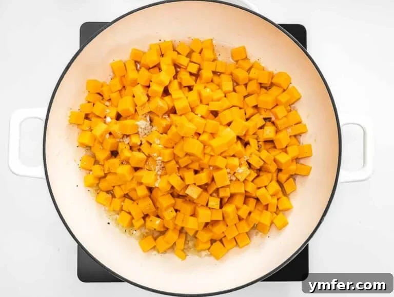 diced butternut squash in the dutch oven