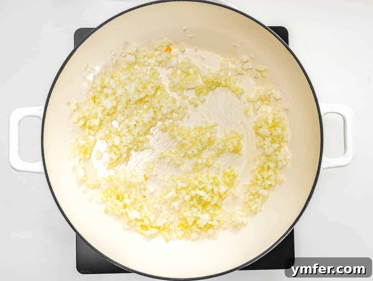Creamy Butternut Squash Risotto 7 Frying finely chopped onion in olive oil until translucent.