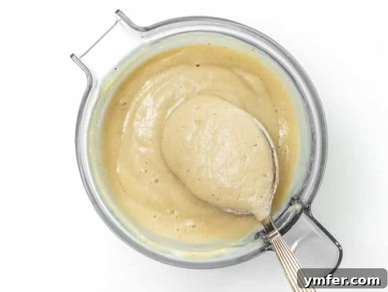 Soup being blended to a smooth consistency with a high-speed blender