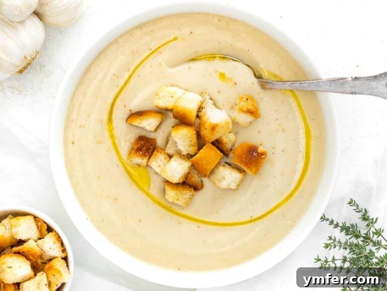 Cauliflower soup served with homemade croutons.