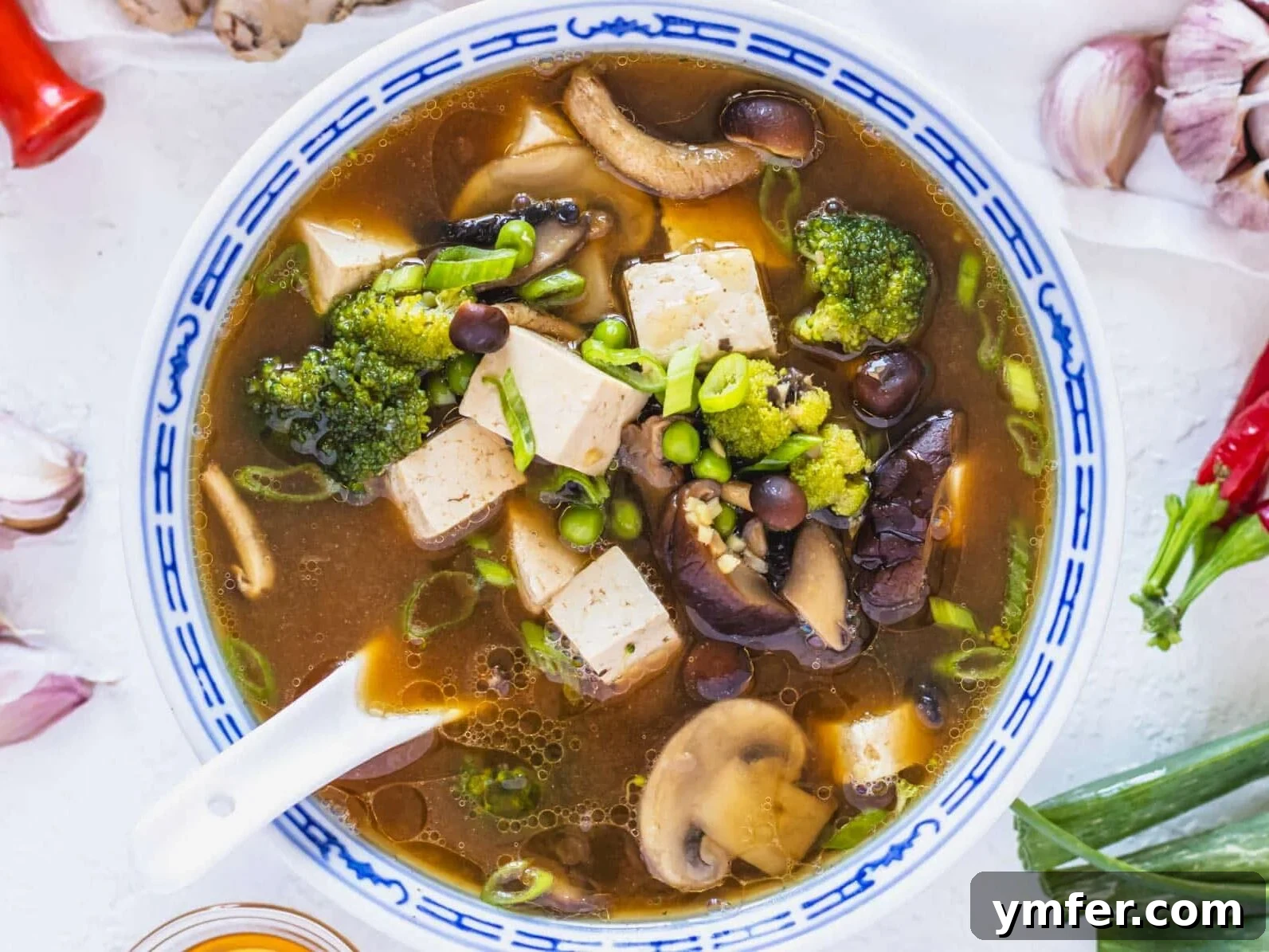 30 Simple Soup Solutions 8 Tofu soup recipe with a white spoon